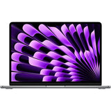 Laptop with a purple abstract design on the screen against a white background