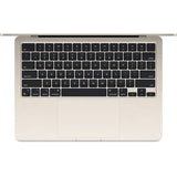 Close-up of a laptop keyboard on a white background