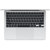 Close-up of a laptop keyboard on a white background