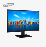 Samsung monitor with colorful building display on screen against a white background