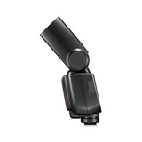 Black camera flash on a white background