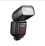 Camera flash with Godox branding on a white background