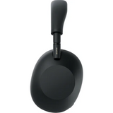 Black frying pan with handle on a white background